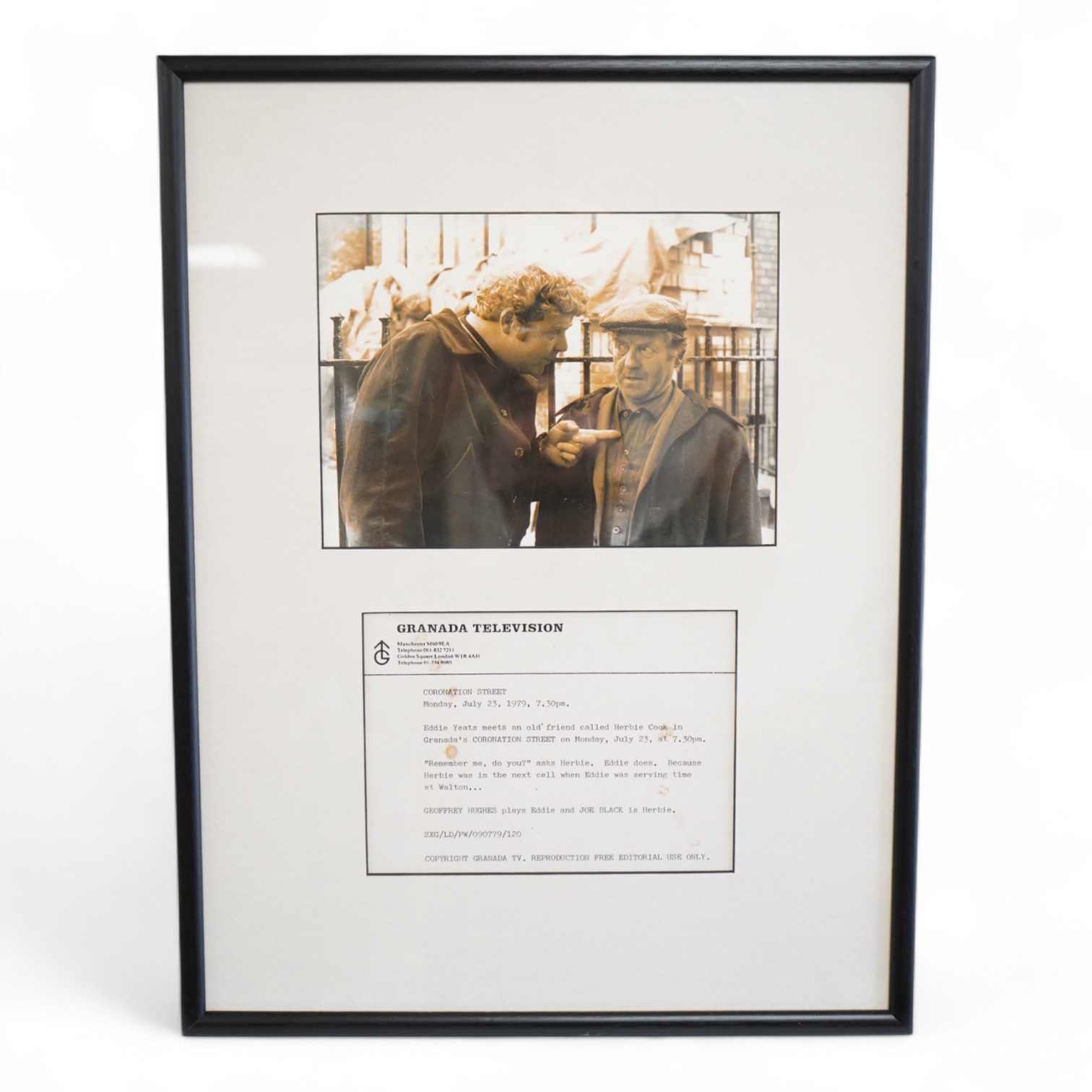 A Granada TV, Coronation Street promotional photograph, Geoffrey Hughes and Joe Black, framed, 51cm high